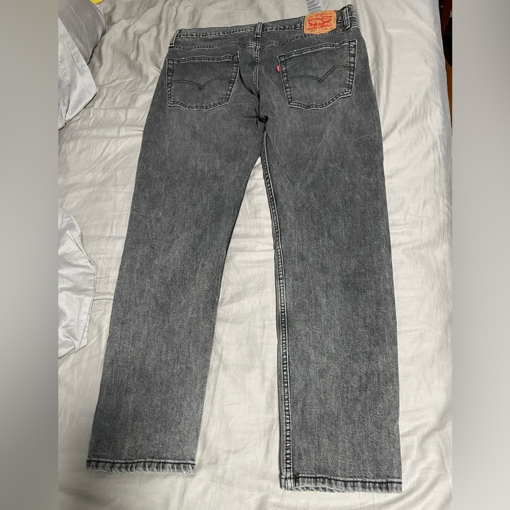 light washed grey Levi’s jeans